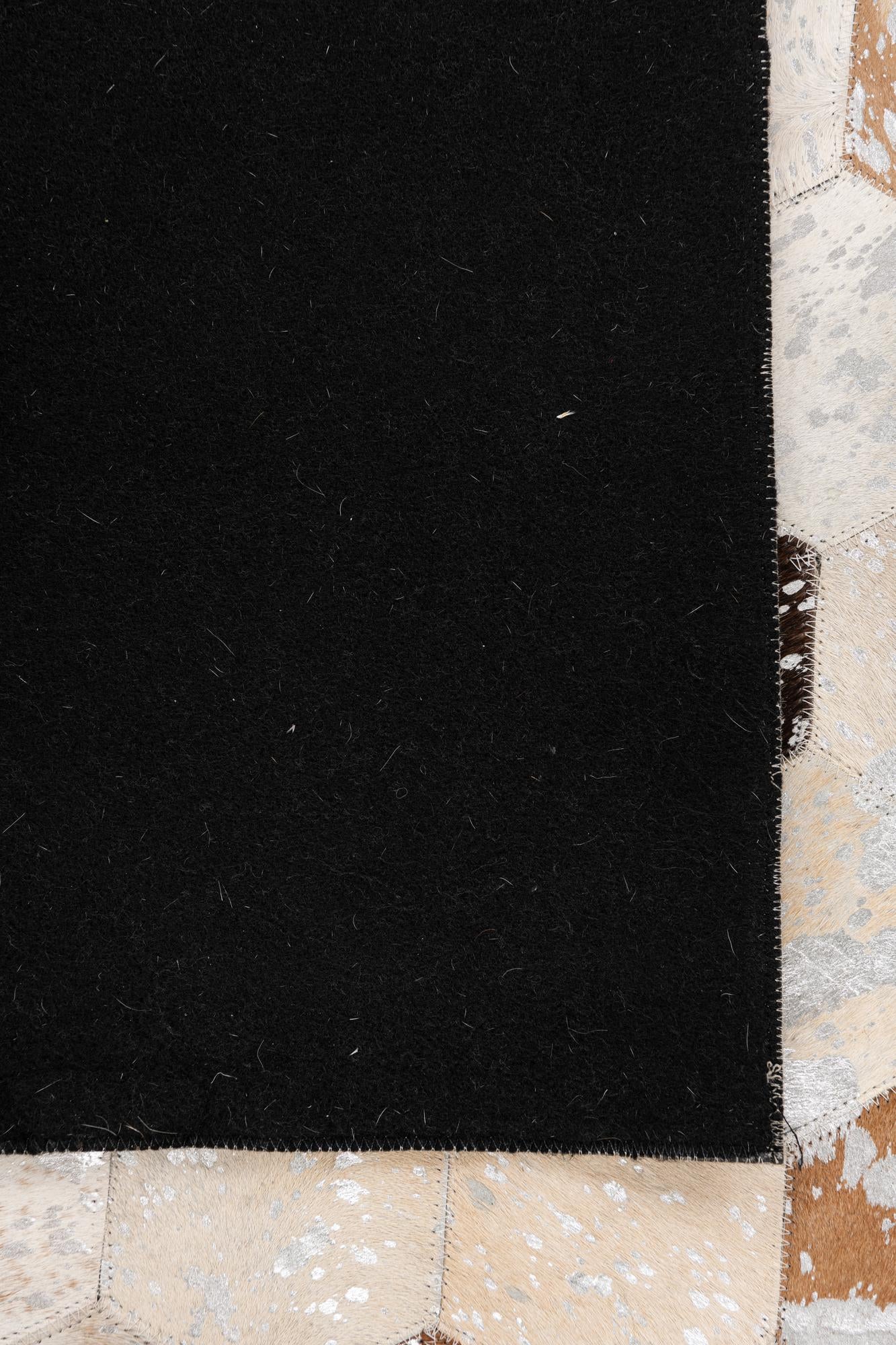 5' 1 x 7' 10 Cowhide Leather Rug