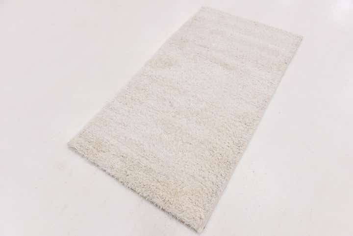 2' 8 x 4' 10 Luxe Solid Shag Rug