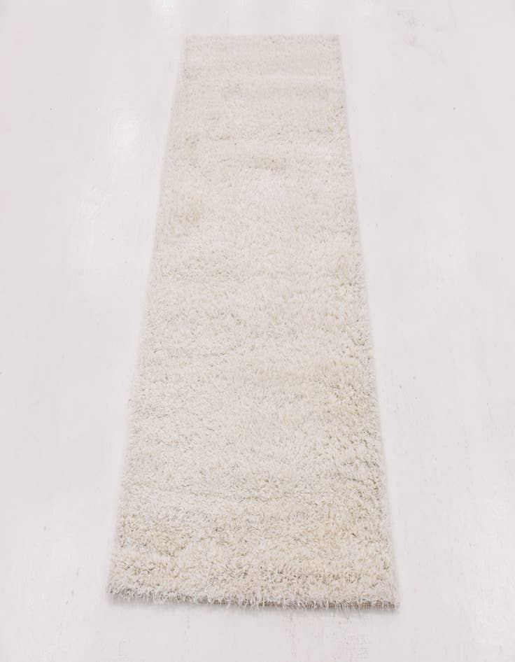 Detail image of 2' 8 x 4' 10 Luxe Solid Shag Rug