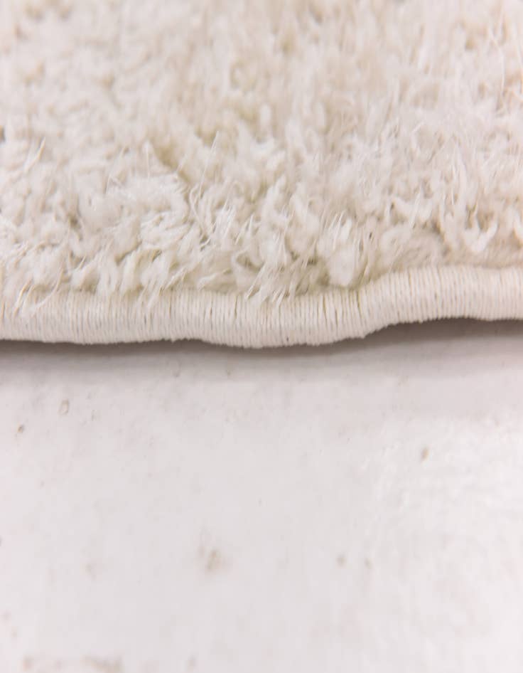 Detail image of 2' 8 x 4' 10 Luxury Solid Shag Rug