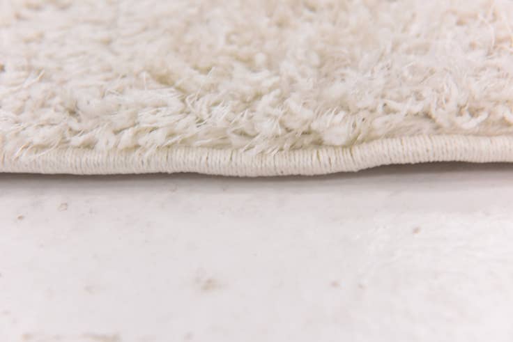 Detail image of 2' 8 x 4' 10 Luxury Solid Shag Rug