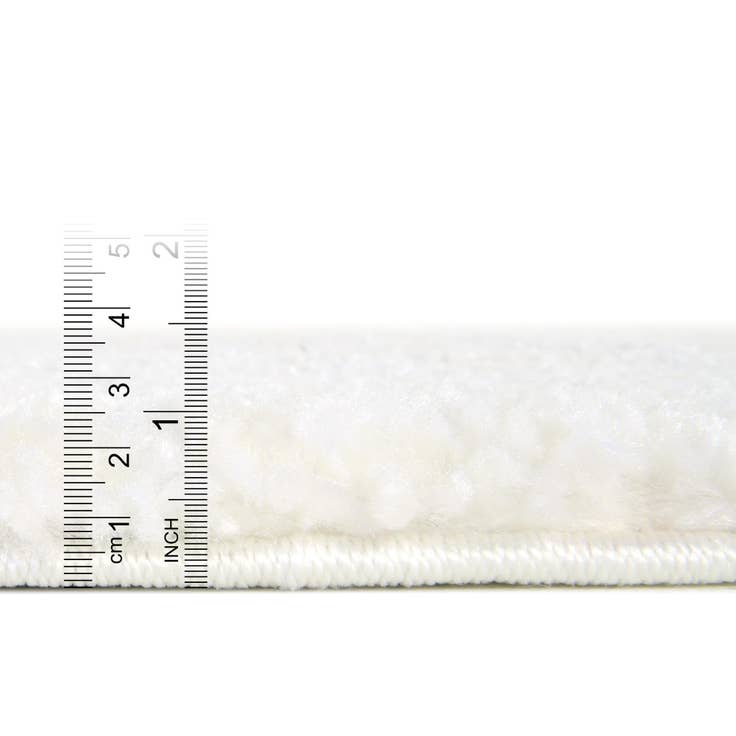 Detail image of 5' 3 x 8' Solid Frieze Rug