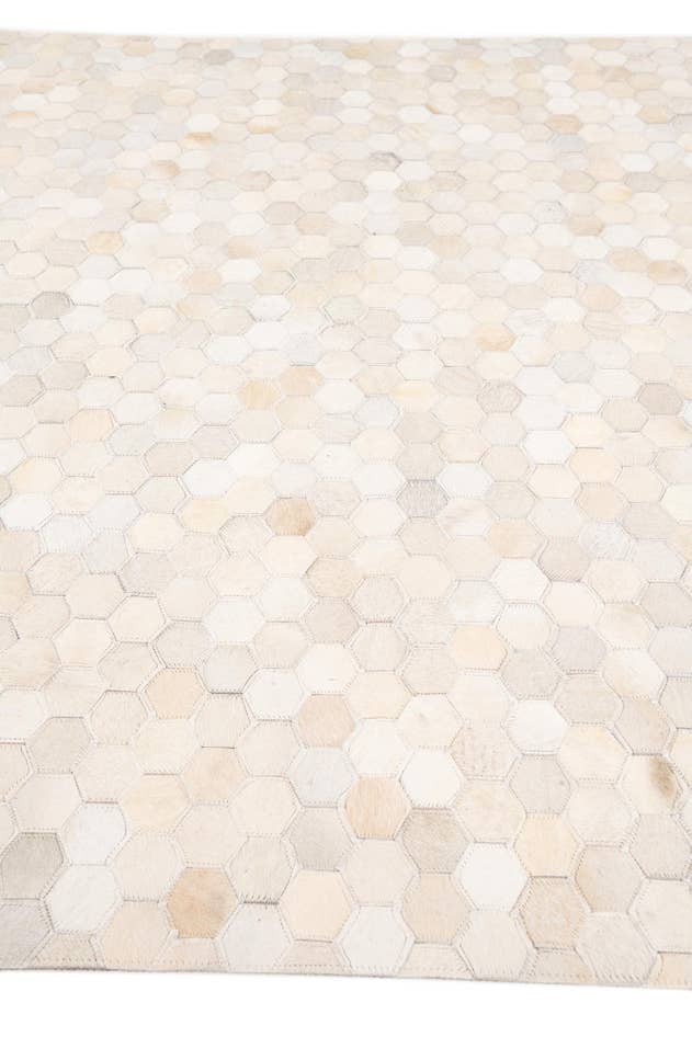 Detail image of 5' x 7' 10 Cowhide Stocks Rug