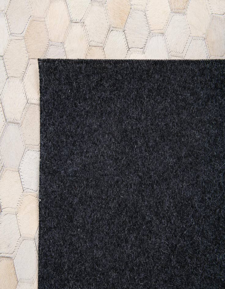 Detail image of 5' x 7' 10 Cowhide Stocks Rug