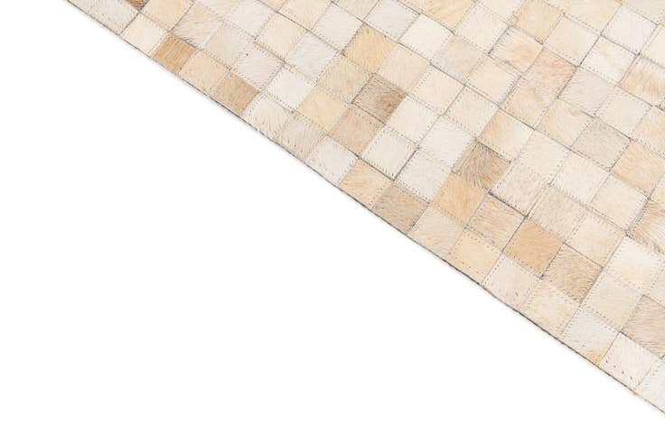 Detail image of 5' x 7' 11 Cowhide Stocks Rug
