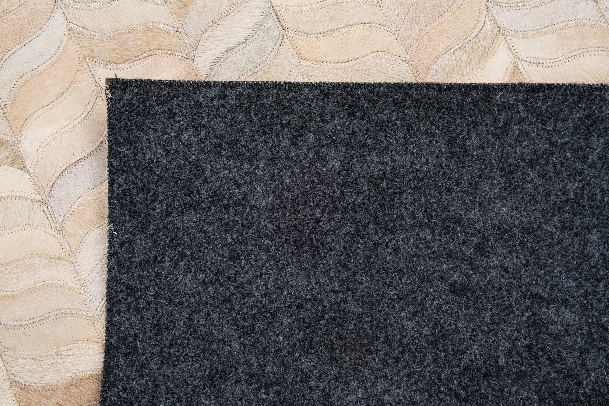 5' 8 x 7' 10 Cowhide Stocks Rug