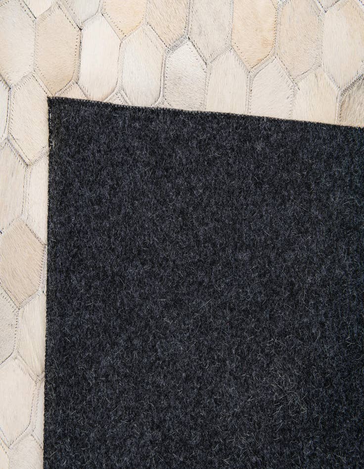 Detail image of 4' 10 x 7' 10 Cowhide Stocks Rug