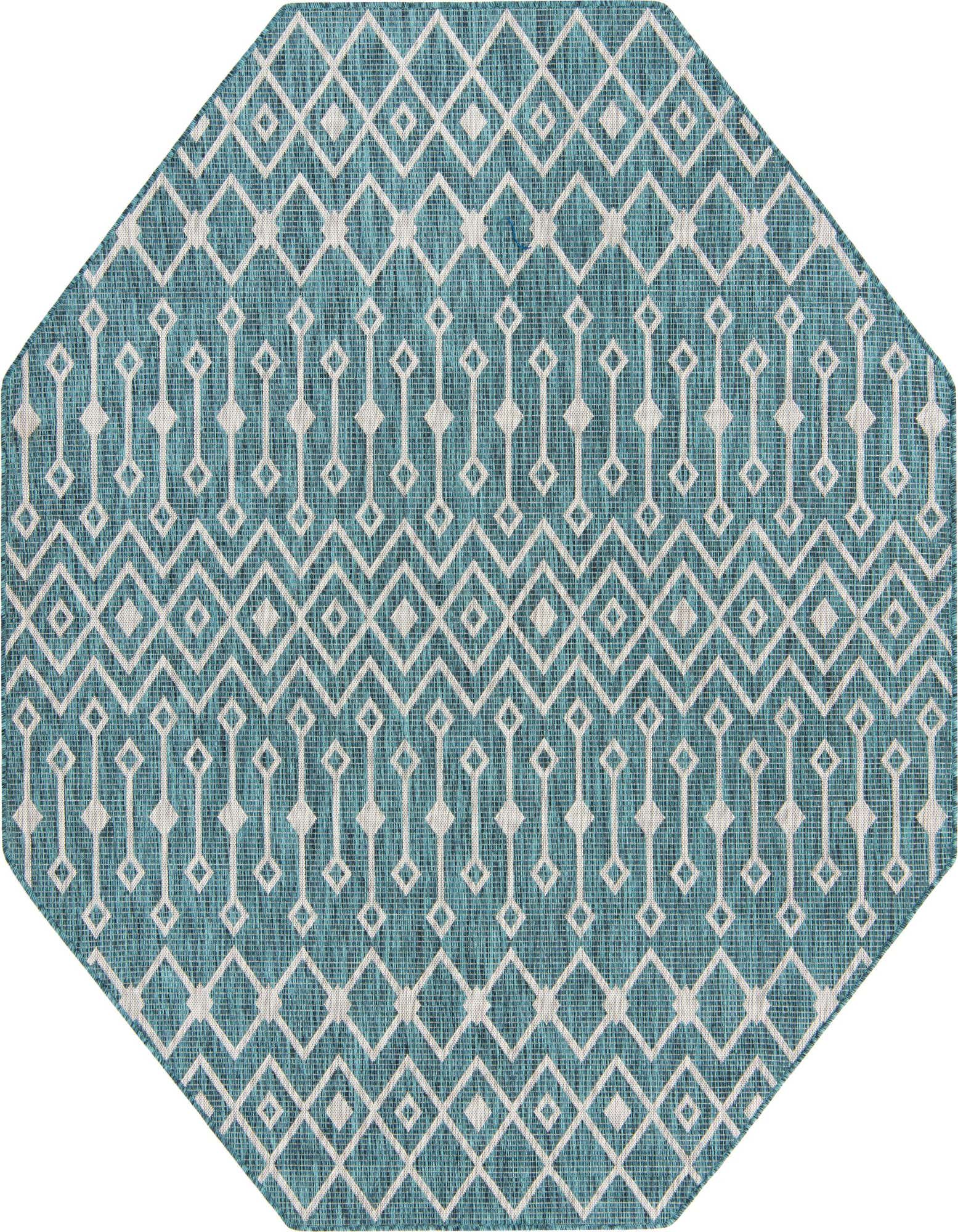 An octagon-shaped outdoor rug featuring a teal background with a repeating white geometric lattice pattern, suitable for a patio.