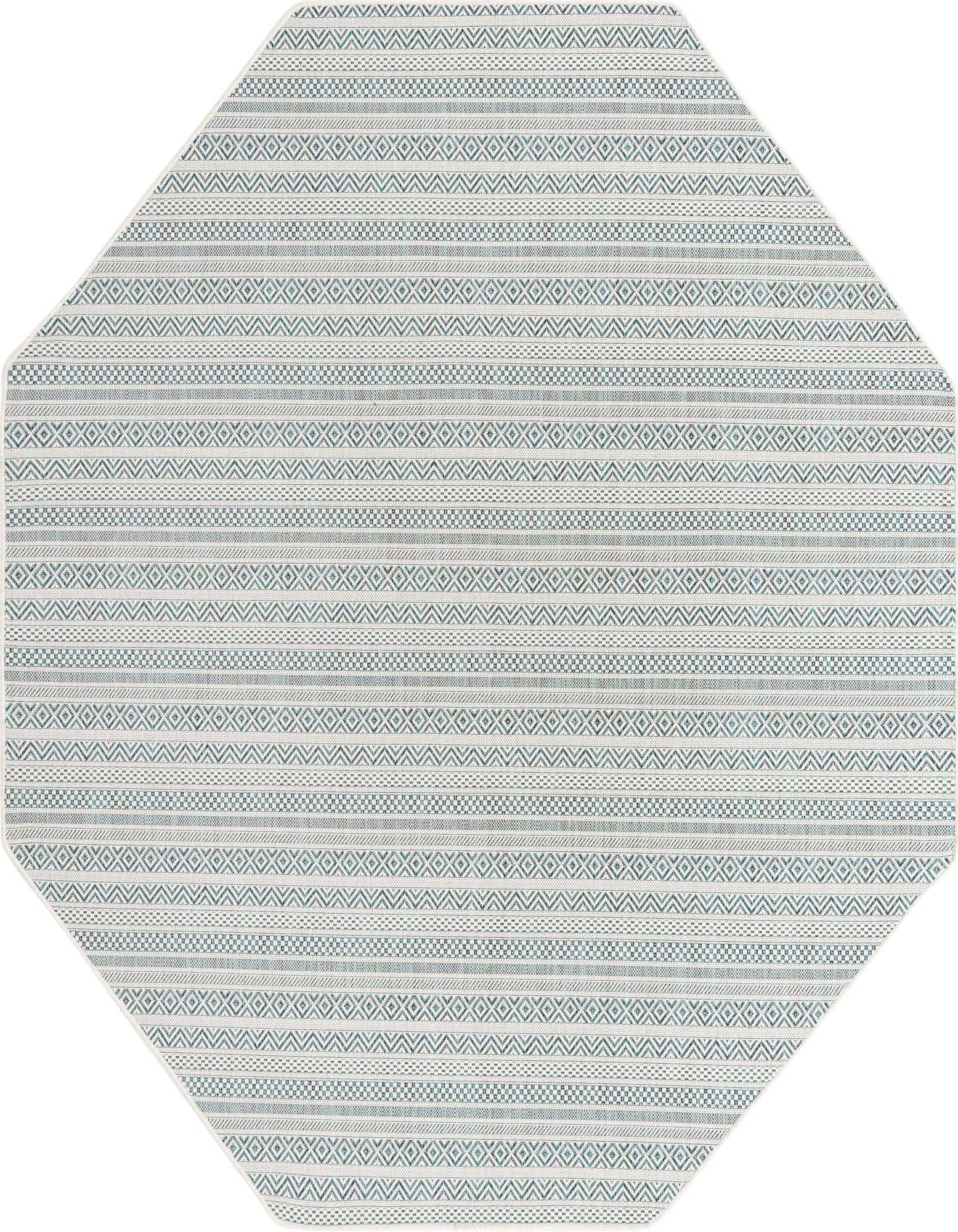 Octagon-shaped indoor/outdoor rug with a tribal pattern in shades of blue and green, ideal for a patio.
