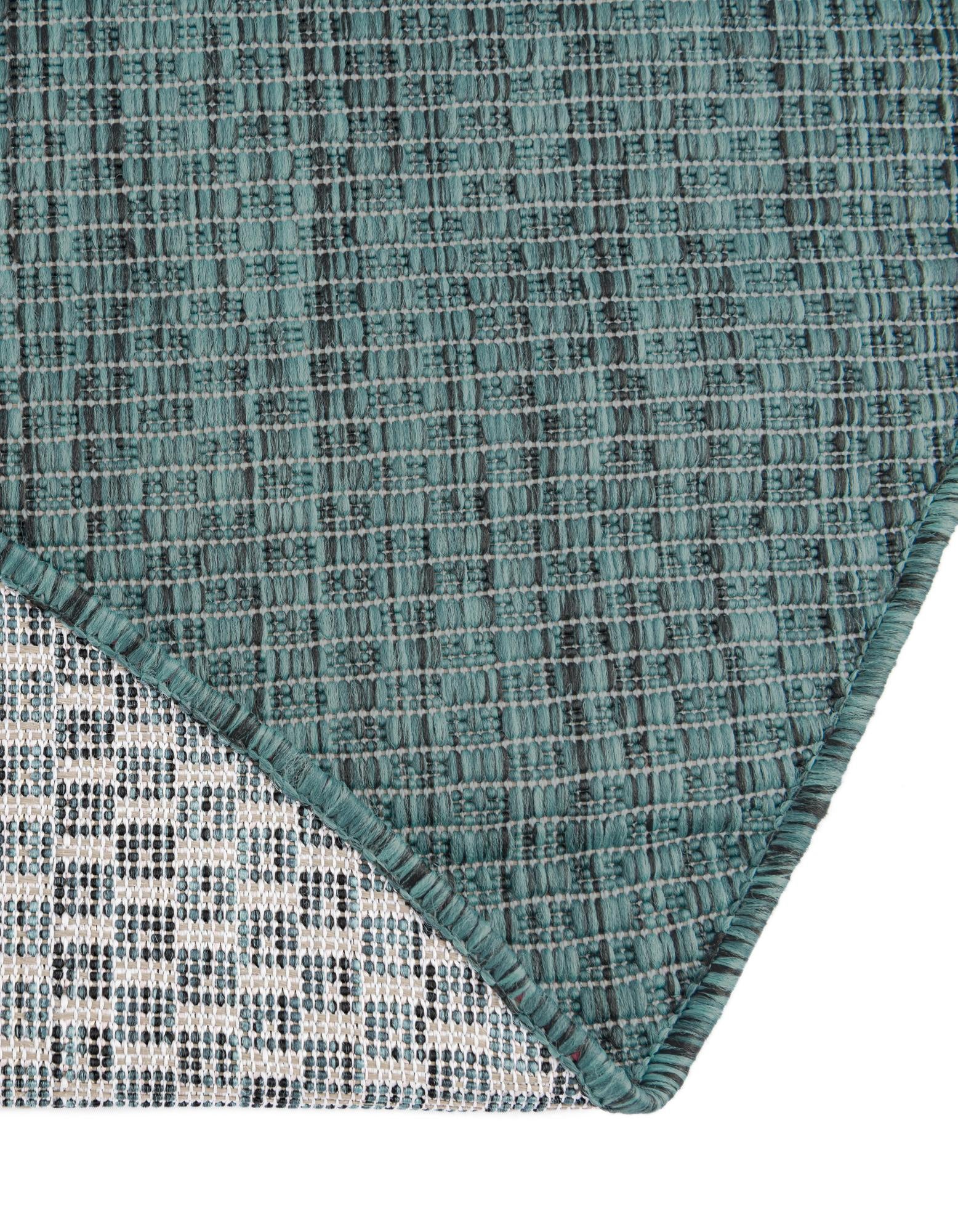4' 1 x 6' 1 Easy-Clean Solid Indoor / Outdoor Oval Rug