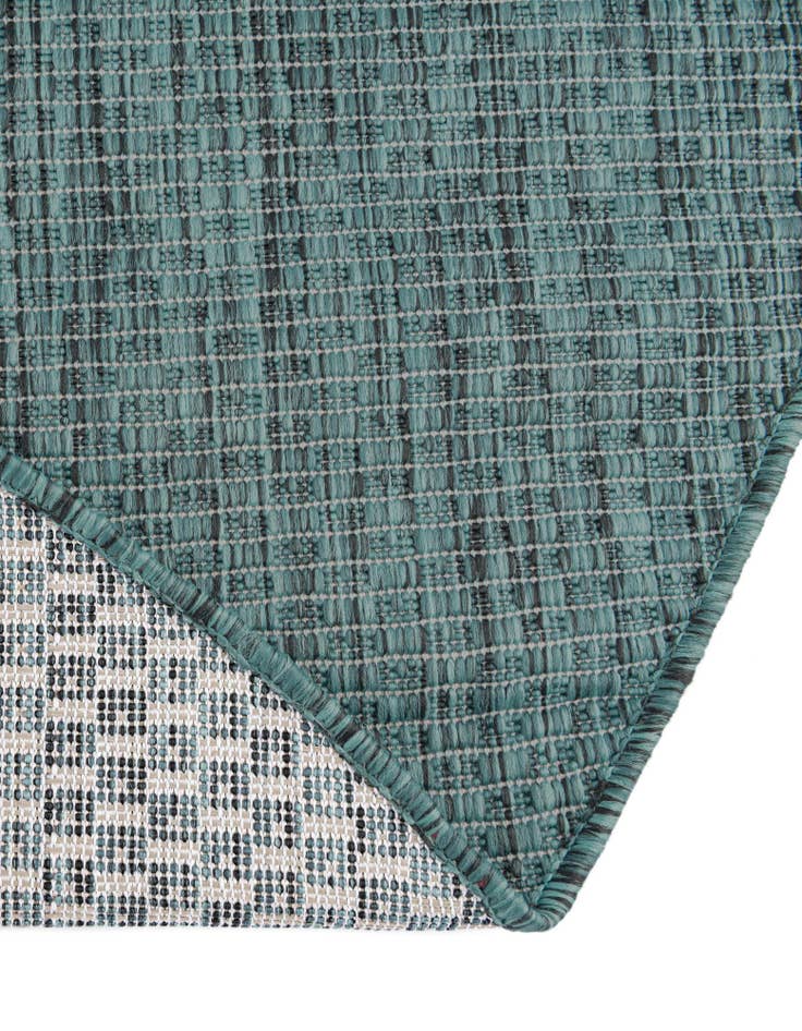 Detail image of 4' 1 x 6' 1 Easy-Clean Solid Indoor / Outdoor Oval Rug