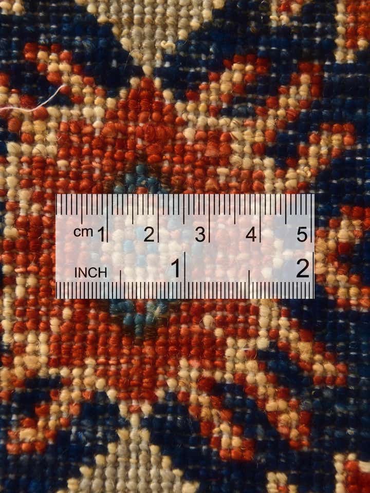5' 7 x 8' Hand Knotted Heriz Rug