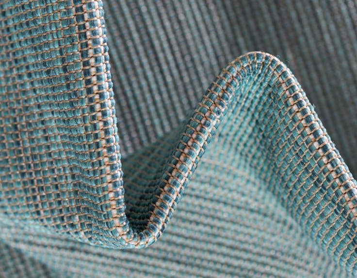 Detail image of 5' 3 x 8' Easy-Clean Solid Indoor / Outdoor Rug