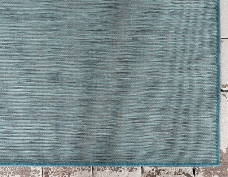 Detail image of 4' 2 x 6' Easy-Clean Solid Indoor / Outdoor Rug