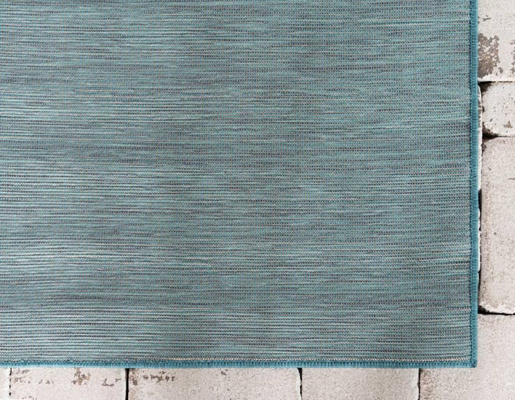 Detail image of 4' 2 x 6' Easy-Clean Solid Indoor / Outdoor Rug