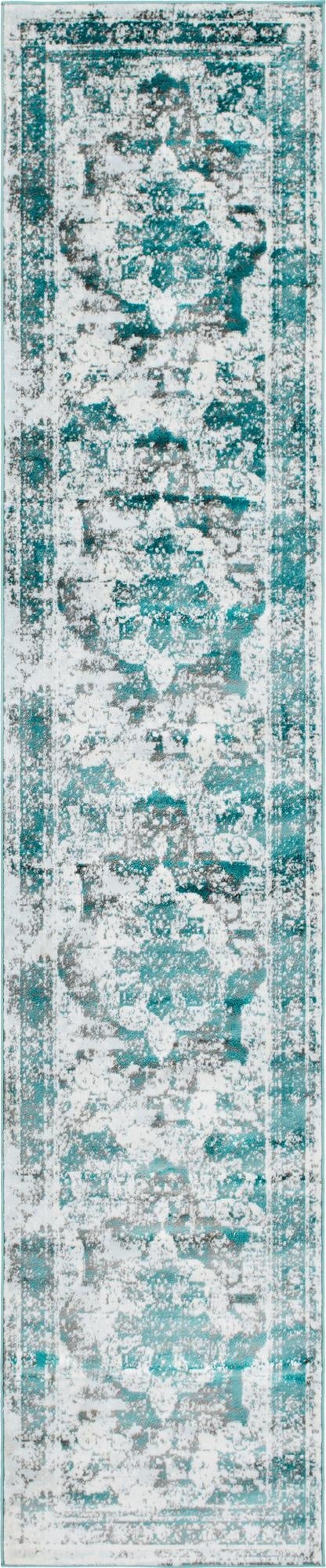 A 16 ft runner rug featuring a distressed bohemian medallion pattern in shades of blue, grey, and white.