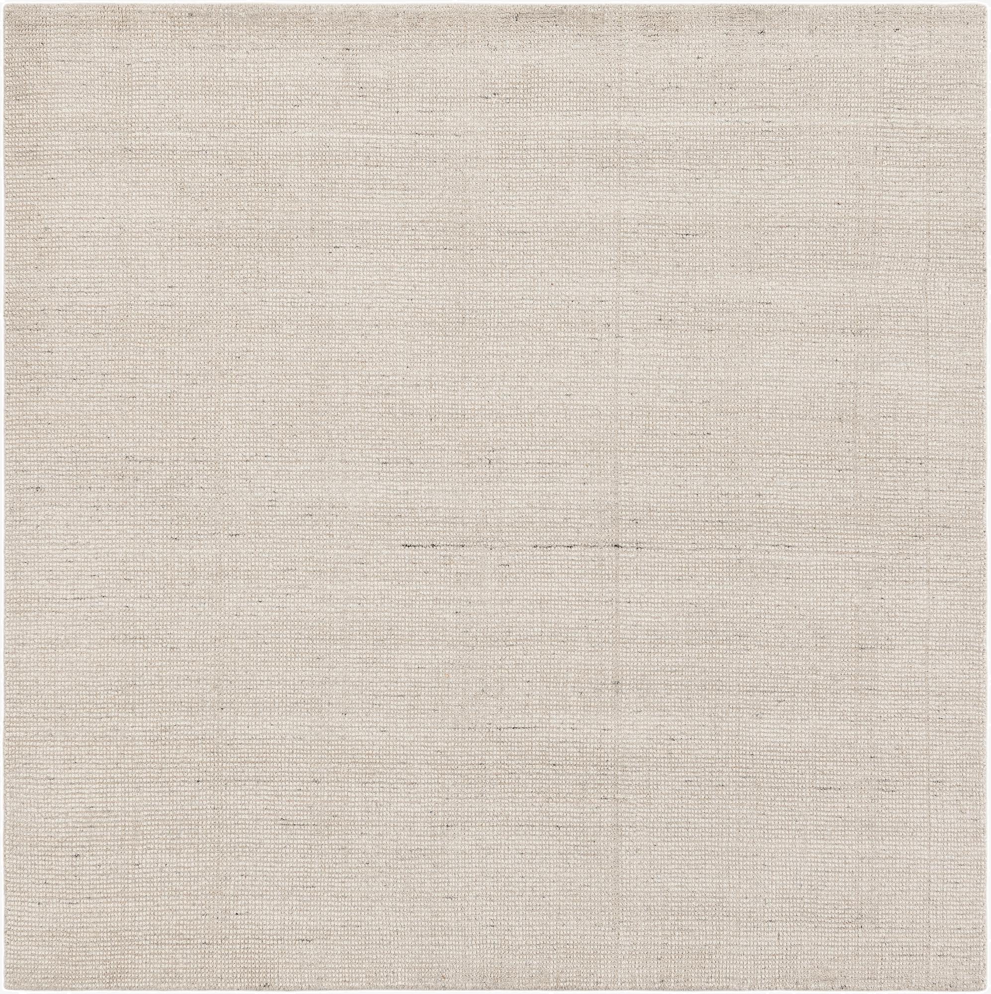 A square 6' 1 x 6' 1 Jill Zarin English Manor rug with a textured, high pile in shades of brown, tan, ivory, cream, and white.