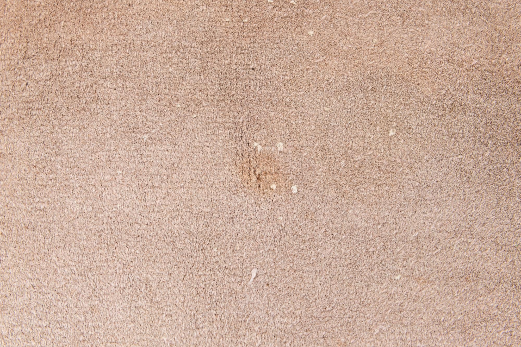 5' 10 x 8' 8 Hand Knotted Antique Finish Wool Rug