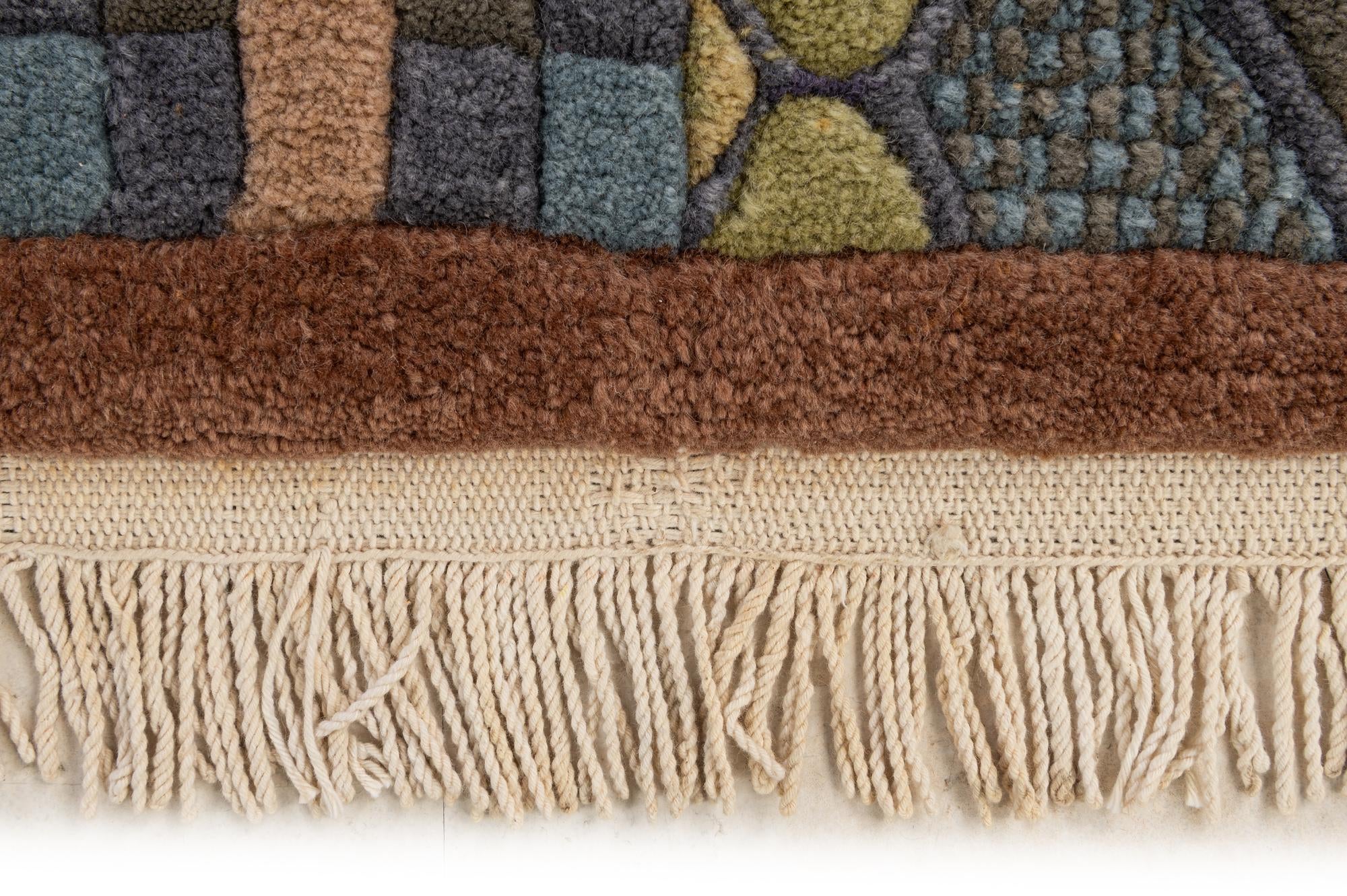 5' 9 x 7' 8 Hand Knotted Nepal Wool Rug