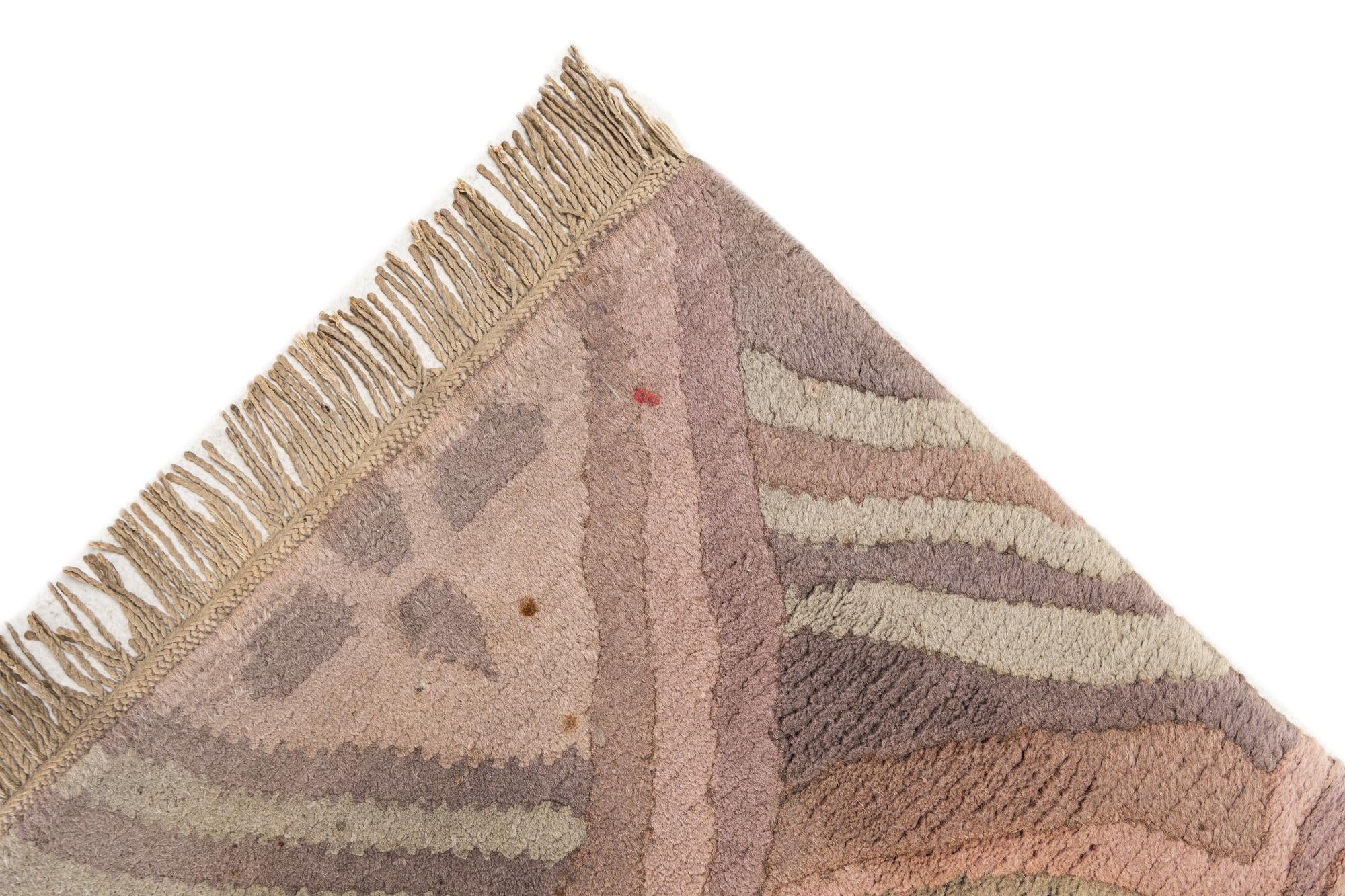 6' 6 x 9' 11 Hand Knotted Nepal Wool Rug