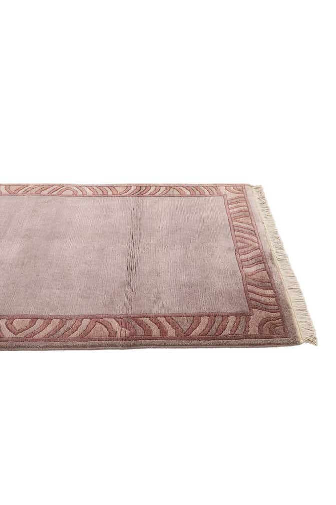 3' 10 x 5' 9 Hand Knotted Tibet Wool Rug