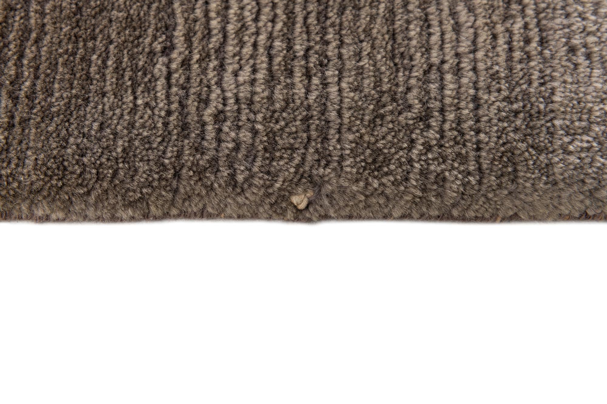 6' 8 x 9' 8 Hand Knotted Tibet Wool Rug