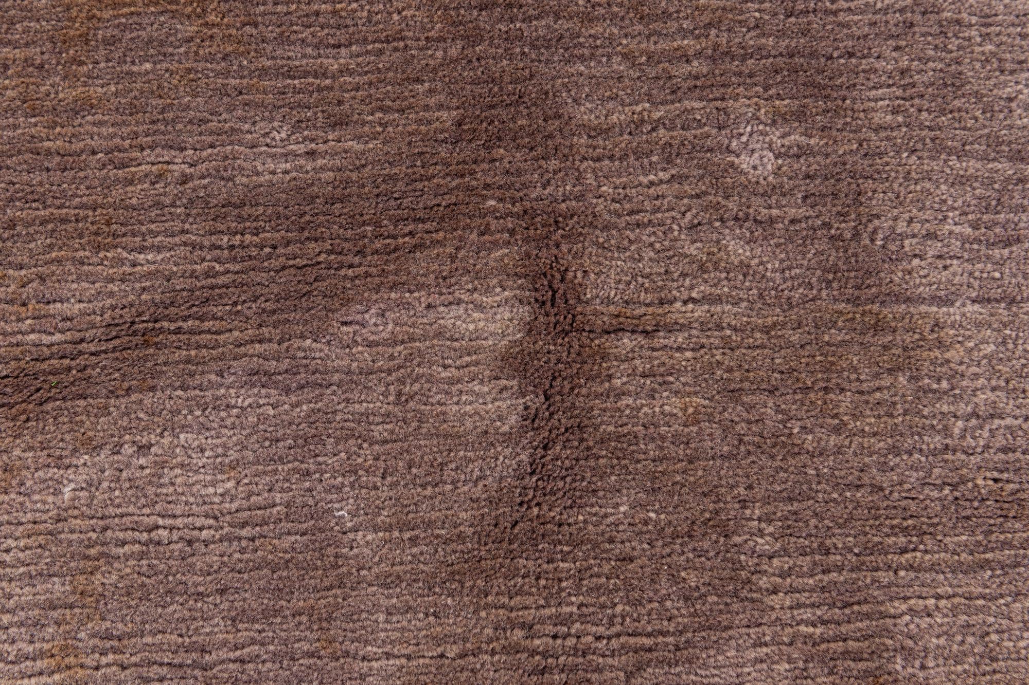 6' 8 x 9' 8 Hand Knotted Tibet Wool Rug
