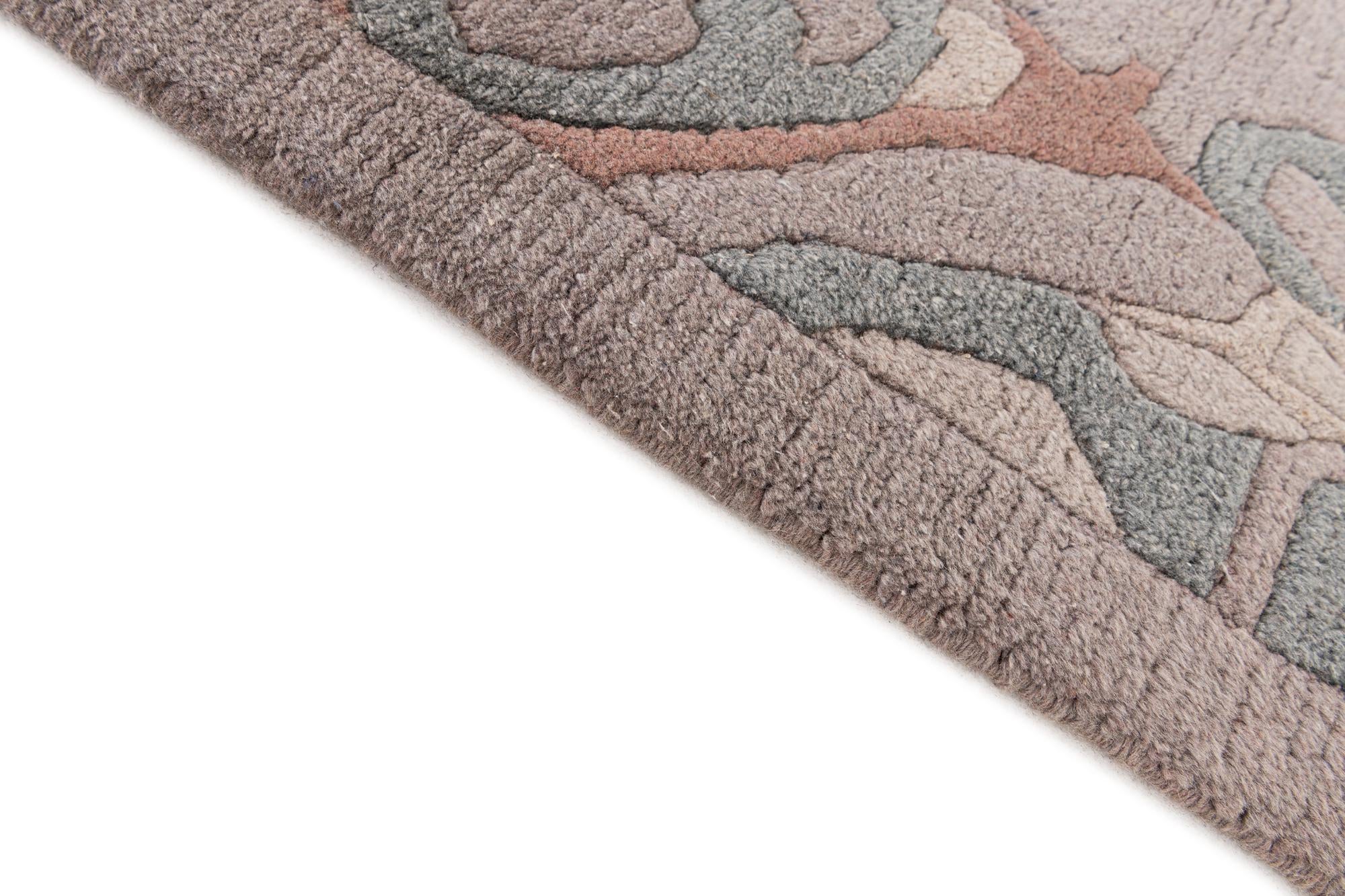 5' 10 x 7' 10 Hand Knotted Tibet Wool Rug