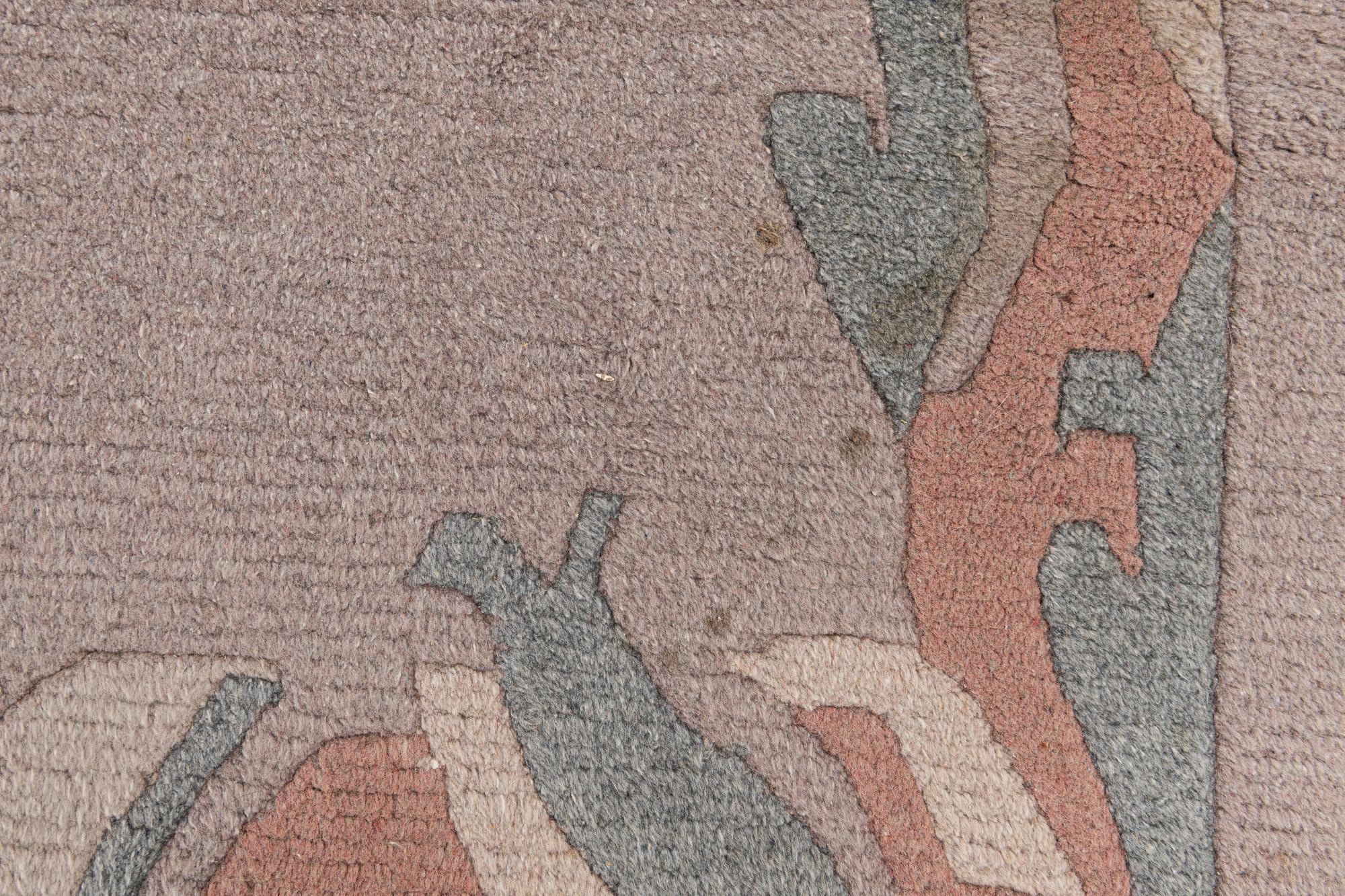 5' 10 x 7' 10 Hand Knotted Tibet Wool Rug