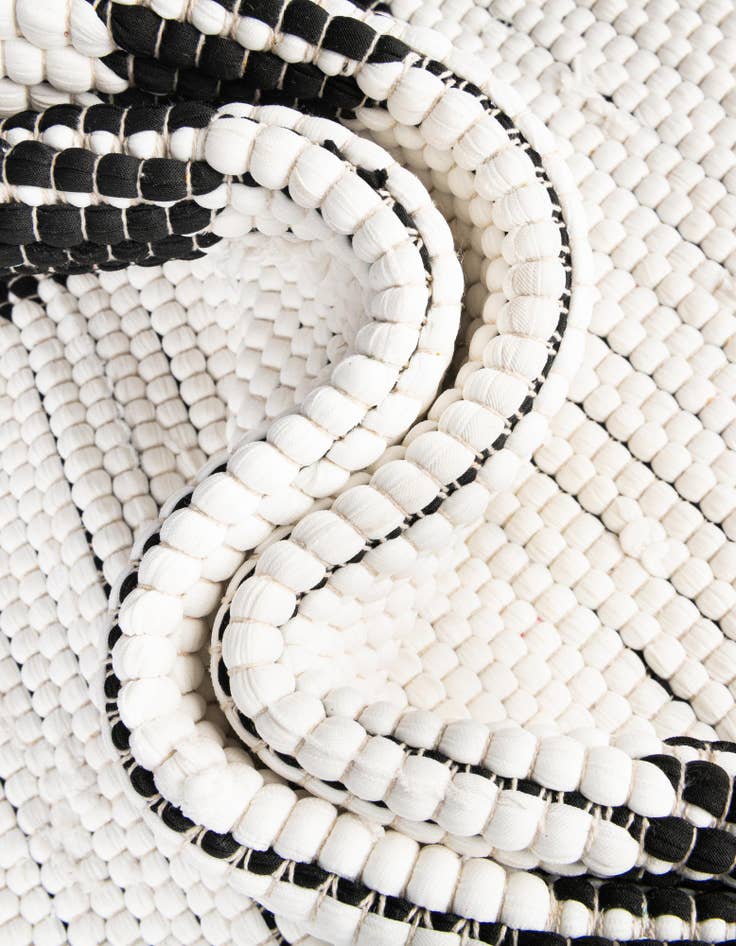 Detail image of 4' 1 x 6' 1  Hand Woven Chindi Jute Rug