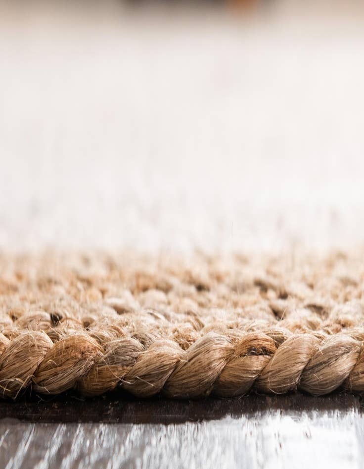Detail image of 8' x 8'  Hand Braided Jute Round Rug