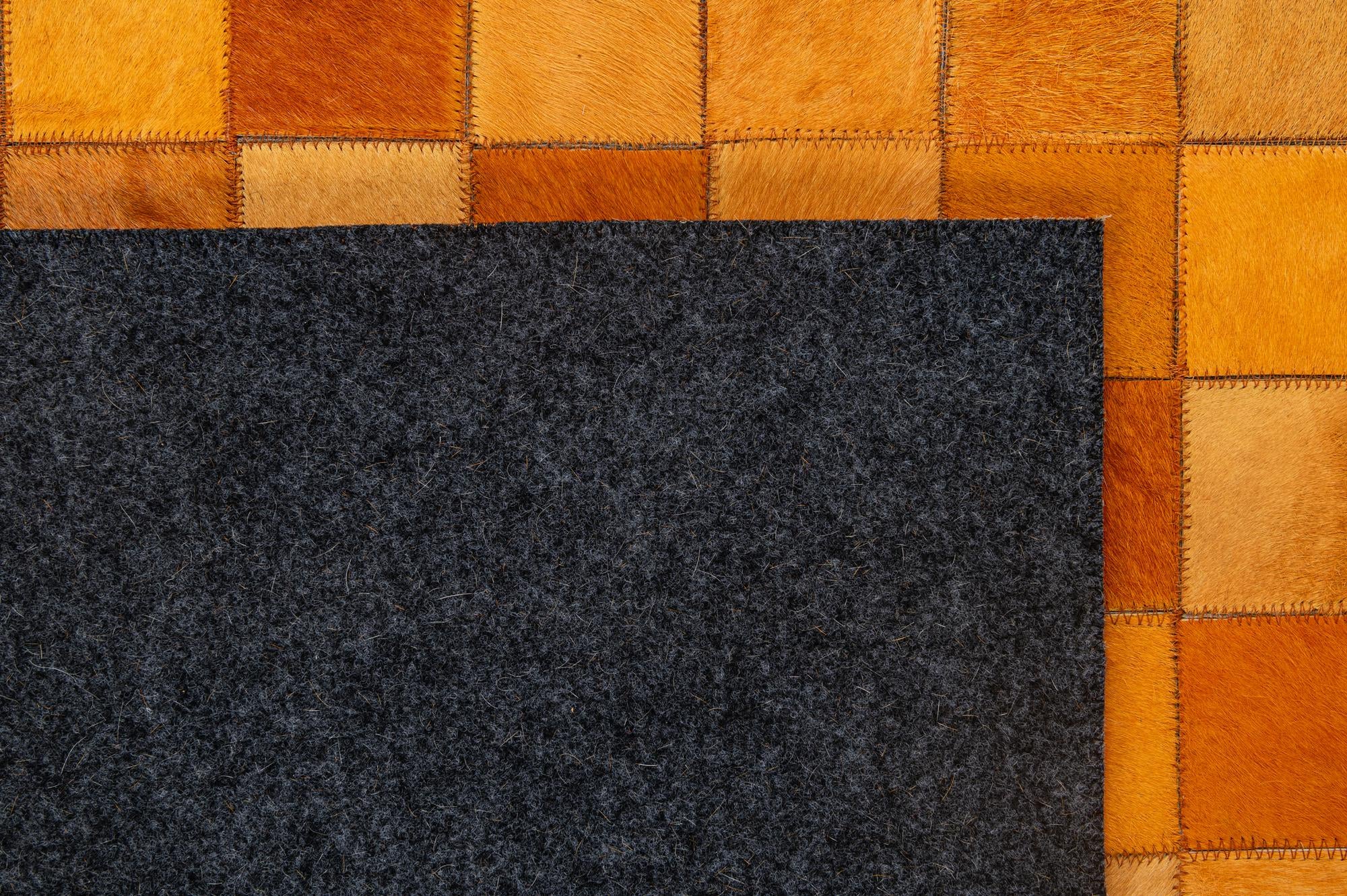 5' 2 x 8' 1 Cowhide - Patchwork Rug