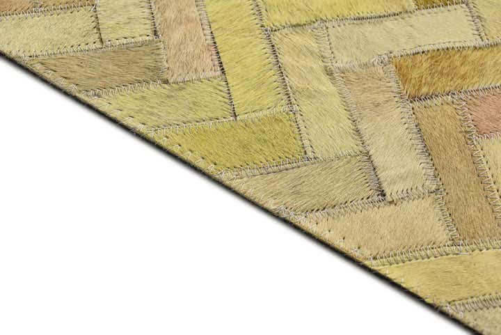 5' 2 x 7' 10 Cowhide Rug