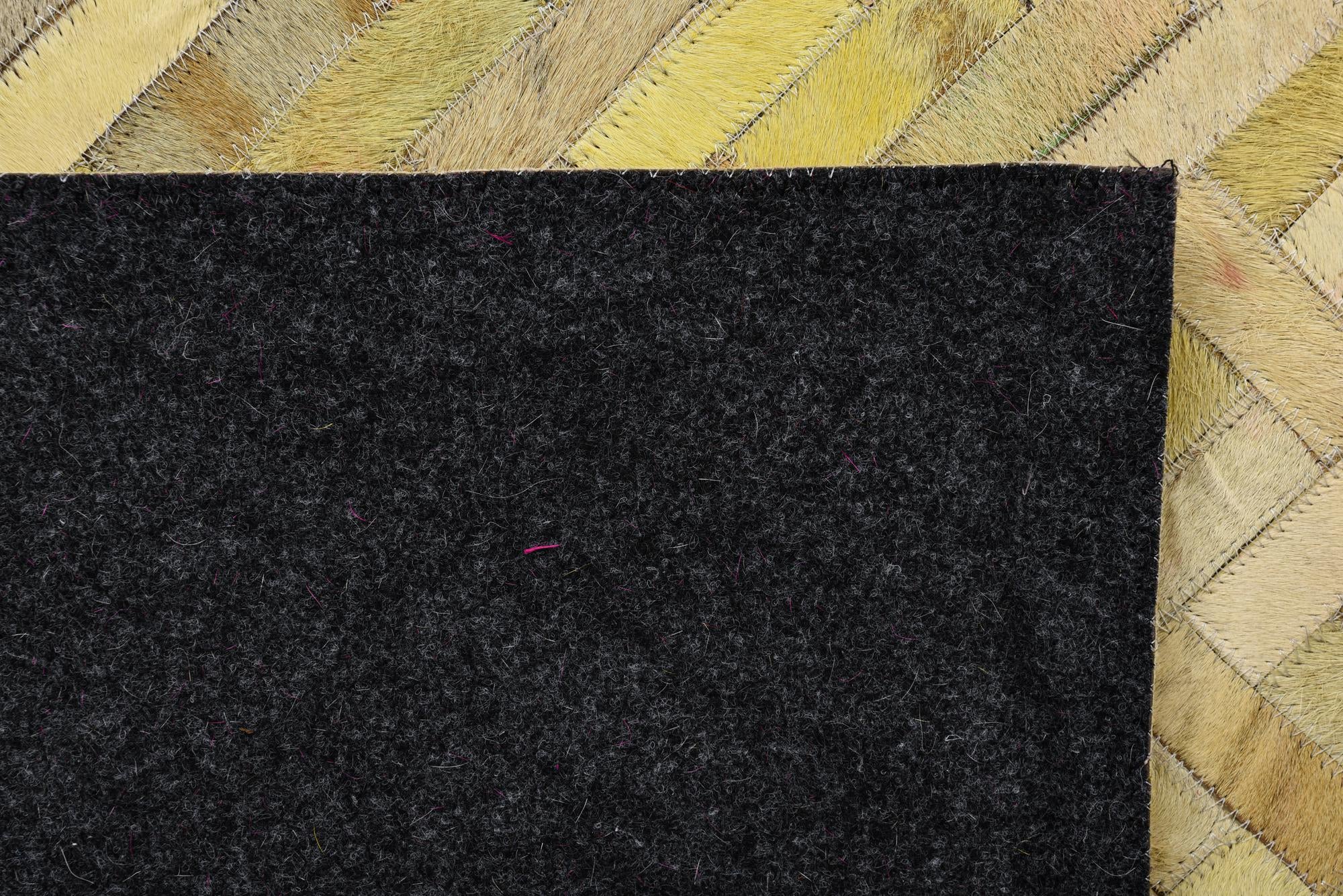 5' 2 x 7' 10 Cowhide Rug