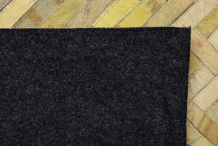 5' 2 x 7' 10 Cowhide Rug