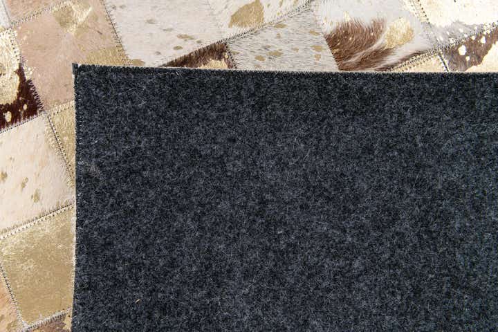 5' x 8' Cowhide Stocks Rug