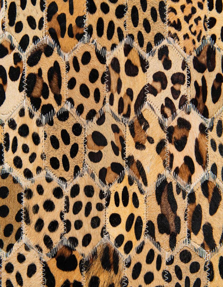 Detail image of 5' x 7' 11 Cowhide Stocks Rug