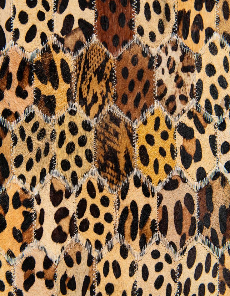 Detail image of 5' x 7' 11 Cowhide Stocks Rug