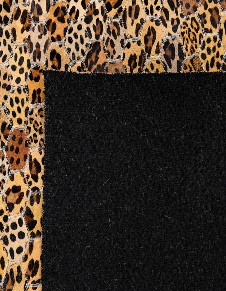 Detail image of 5' x 7' 11 Cowhide Stocks Rug