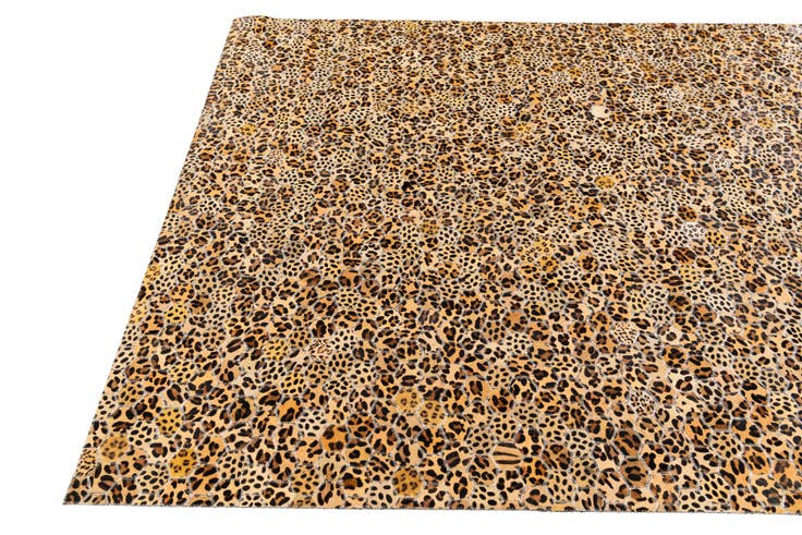 Detail image of 5' x 7' 11 Cowhide Stocks Rug