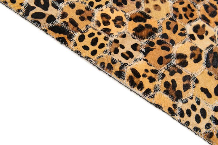 Detail image of 4' 11 x 8' Cowhide Stocks Rug