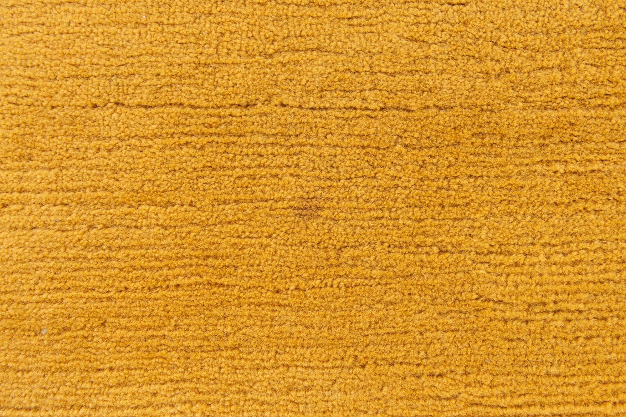 5' 8 x 8' 2 Hand Knotted Tibet Wool Rug