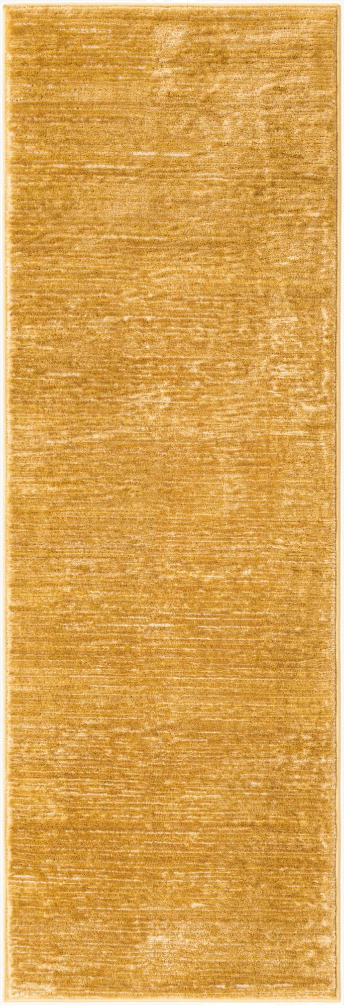 A 6 ft runner rug in varying shades of yellow and gold, featuring a modern, textured high-low pile.